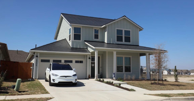 Figure | Home with Tesla Solar Roof and Powerwall Source: Electrek
