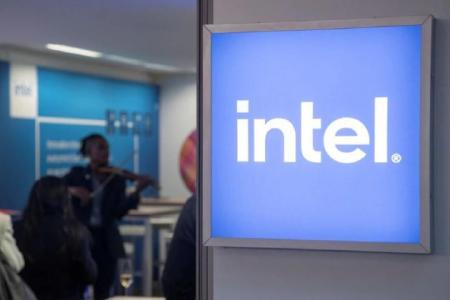 Intel lowers annual revenue forecast, lays off workers and cuts costs